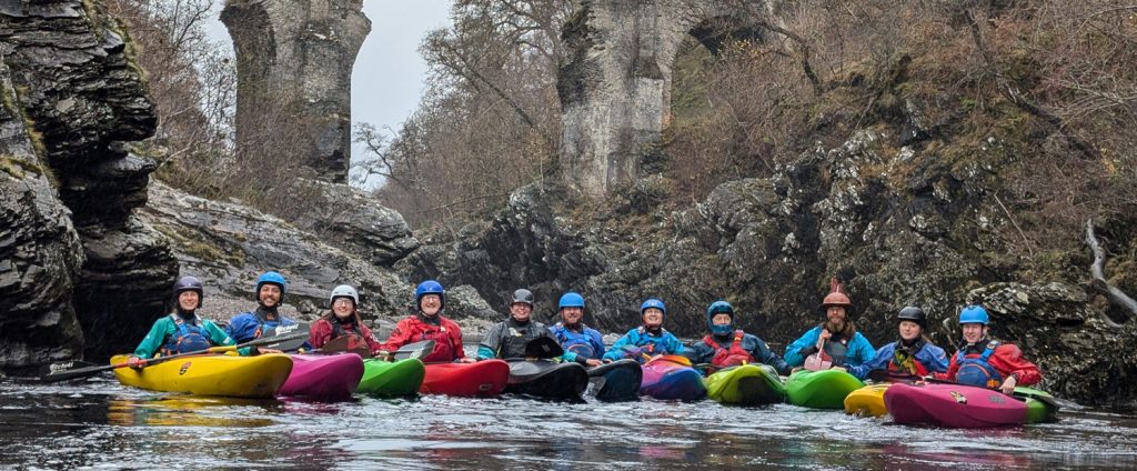 London Kayak School Canoe Club Group on a River